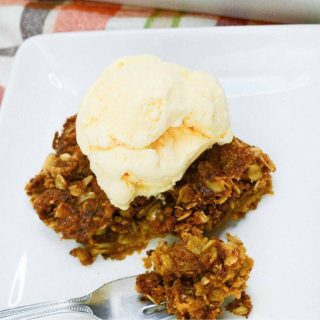 Pumpkin crisp on plate with ice cream
